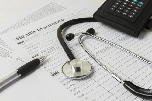 Healthcare professional ensuring HIPAA compliance in medical billing